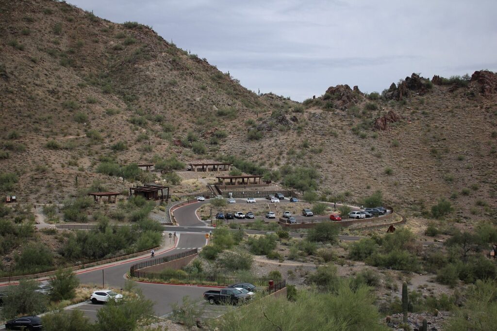 Parking lots and shade ramadas along the park road below Piestewa Peak, one of the busiest trailheads for hiking in Phoenix